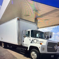 Ford L7000 moving truck with lift gate